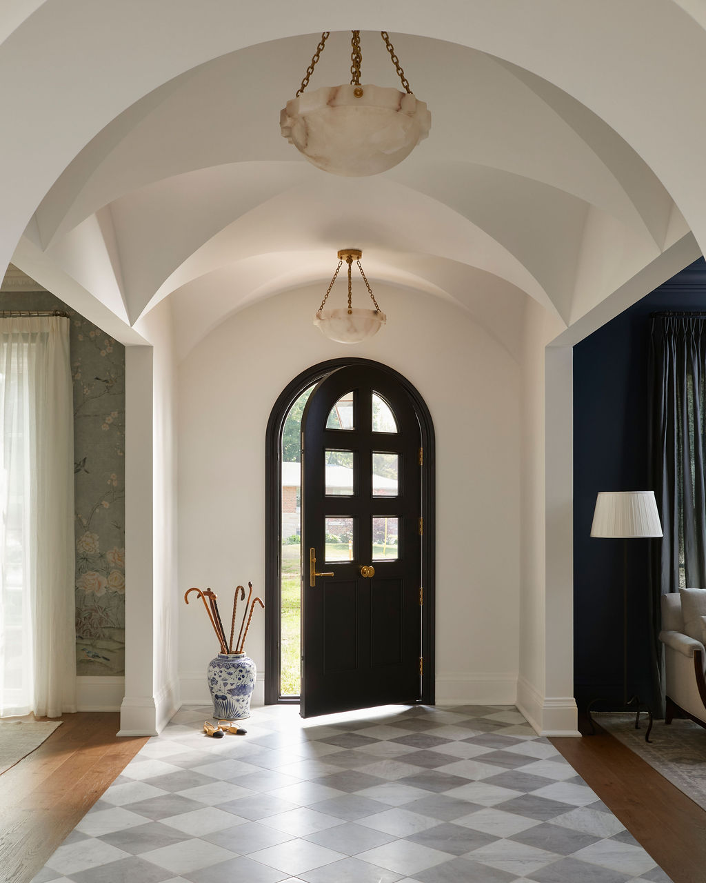 Grand foyer with custom drapery